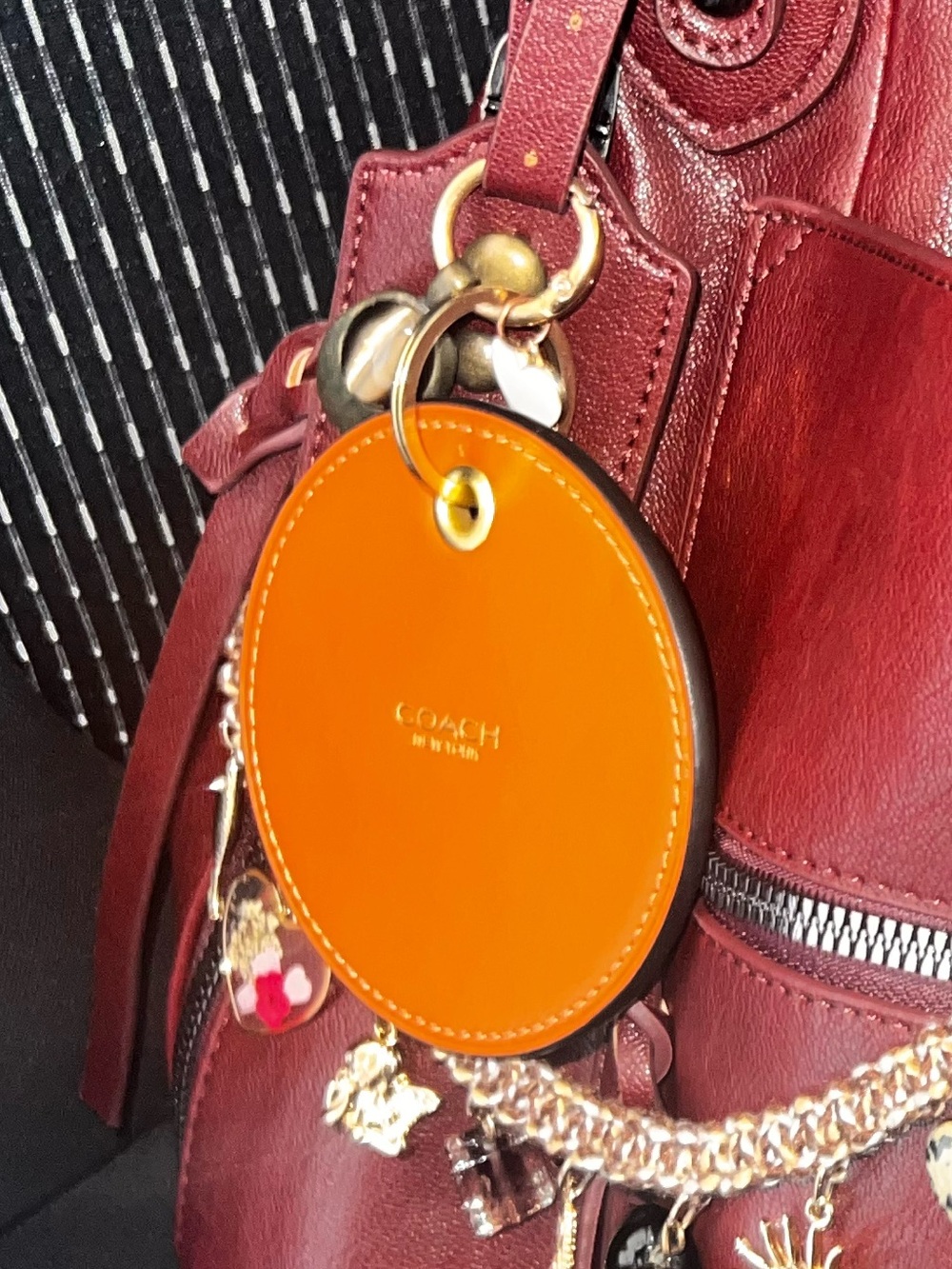 COACH coasters up crafted charm Orange